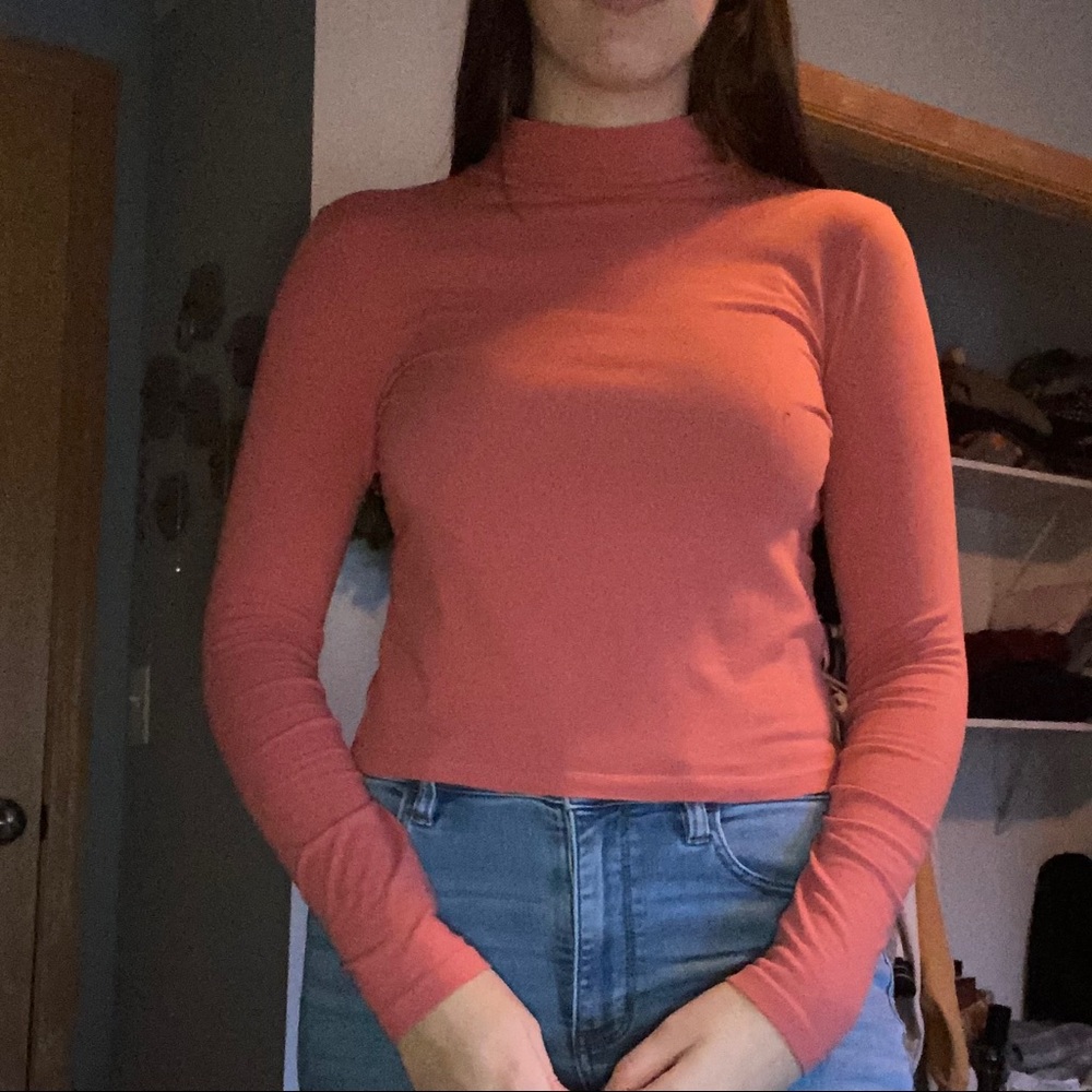Pink turtleneck top